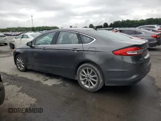 2017 Ford Fusion SE z VIN 3FA6P0HDXHR122962, wystawiony jako Copart lot #64964565 z przebiegiem 139 005 mil mil oraz Czysty tytuł • Clean title. Historia ofert i sprzedaży dostępna na DreamBid. Obrazek 2.