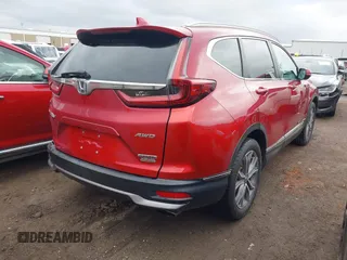 2020 Honda CR-V Touring with VIN 5J6RW2H94LL017434, listed as a IAAI auction lot 41556184 with 97,016 mi miles and . Bid and sale history available at DreamBid. Image 4.