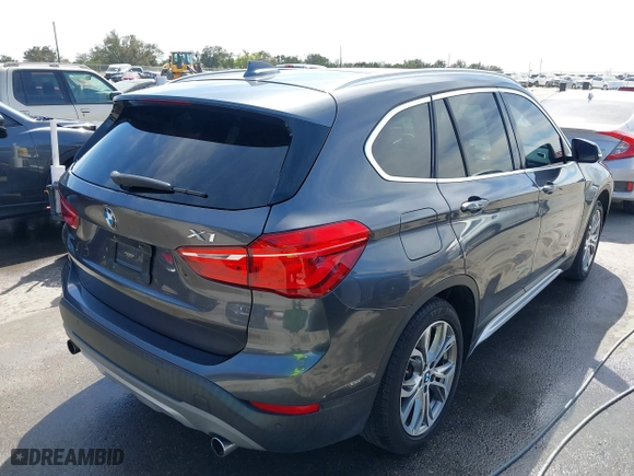 2017 BMW X1 xDrive28i with VIN WBXHT3Z33H4A65198, listed as a IAAI auction lot 41798503 with 88,951 mi miles. Bid and sale history available at carsss.com. Image 4.