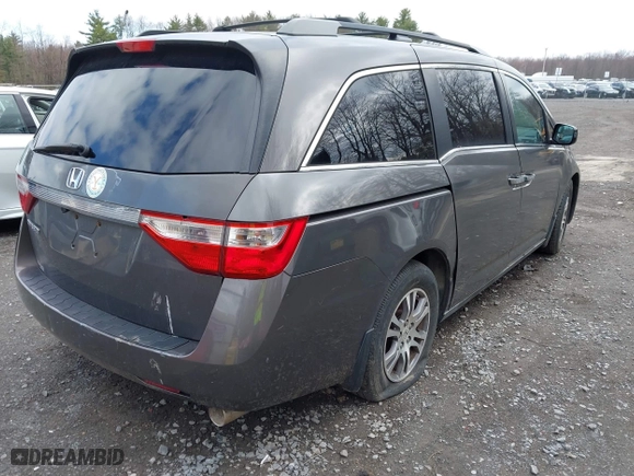 2012 Honda Odyssey EX with VIN 5FNRL5H42CB086159, listed as a IAAI auction lot 42096834 with 208,701 mi miles. Bid and sale history available at carsss.com. Image 4.