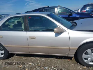 2001 Toyota Camry CE z VIN 4T1BG22K01U053432, wystawiony jako IAAI lot #42257822 z przebiegiem 128 610 mil mil oraz . Historia ofert i sprzedaży dostępna na DreamBid. Obrazek 13.