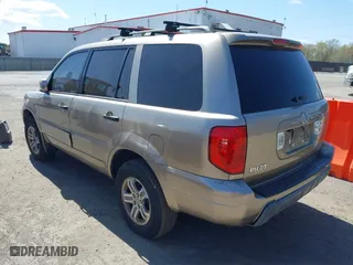 2003 Honda Pilot EX with VIN 2HKYF18613H527391, listed as a IAAI auction lot 41973453 with 253,652 mi miles. Bid and sale history available at carsss.com. Image 3.