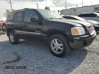 2006 GMC Envoy SLE z VIN 1GKDS13S062176000, wystawiony jako Copart lot #57672995 z przebiegiem 161 455 mil mil oraz Szkoda całkowita • Salvage title. Historia ofert i sprzedaży dostępna na DreamBid. Obrazek 4.