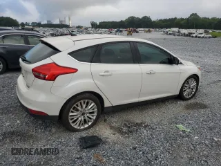2016 Ford Focus Titanium with VIN 1FADP3N22GL292399, listed as a Copart auction lot 63033385 with 180,653 mi miles and Clean title. Bid and sale history available at DreamBid. Image 3.