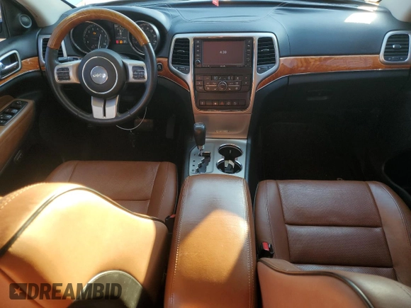 2013 Jeep Grand Cherokee Overland with VIN 1C4RJECG9DC644823, listed as a Copart auction lot 83232414 with 193,205 mi miles and Salvage Title. Bid and sale history available at carsss.com. Image 8.