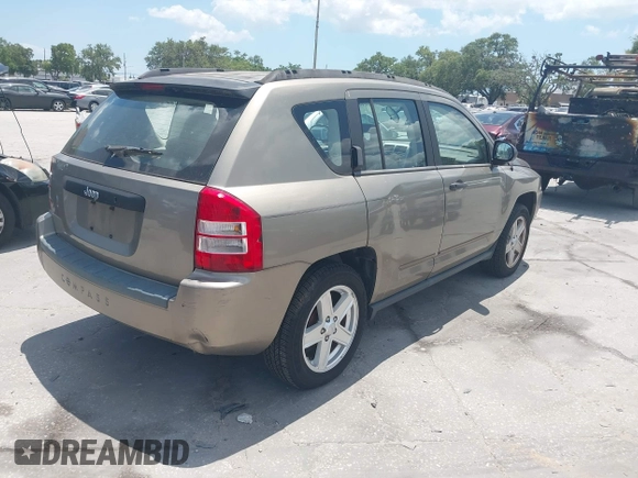 2008 Jeep Compass Sport with VIN 1J8FT47068D593407, listed as a IAAI auction lot 42188334 with 99,736 mi miles. Bid and sale history available at carsss.com. Image 4.