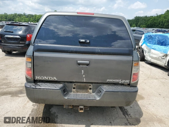 2008 Honda Ridgeline RTL z VIN 2HJYK16528H529507, wystawiony jako Copart lot #60049855 z przebiegiem 173 863 mil mil oraz Szkoda całkowita • Salvage title. Historia ofert i sprzedaży dostępna na DreamBid. Obrazek 6.