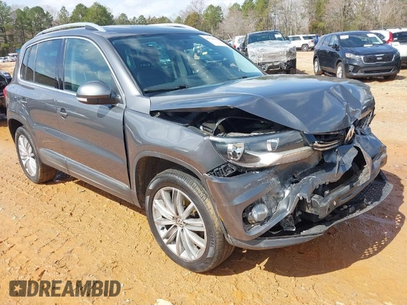 2015 Volkswagen Tiguan SE z VIN WVGBV7AXXFW503955, wystawiony jako IAAI lot #41730076 z przebiegiem 146 446 mil mil oraz . Historia ofert i sprzedaży dostępna na DreamBid. Obrazek 1.