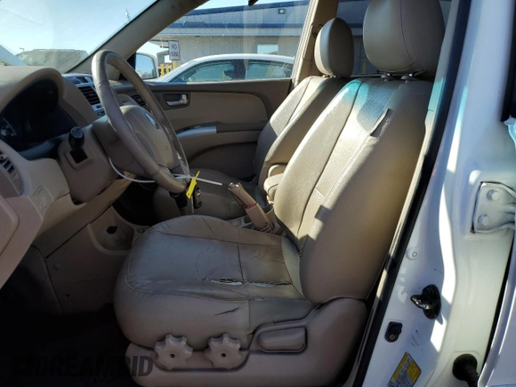 2005 Kia Sportage LX with VIN KNDJF723857134398, listed as a Copart auction lot 87893375 with 186,405 mi miles and Salvage Title. Bid and sale history available at carsss.com. Image 7.