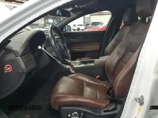 2016 Jaguar XF S with VIN SAJBG4BV0GCY00411, listed as a Copart auction lot 66068964 with 94,983 mi miles and Salvage Title. Bid and sale history available at carsss.com. Image 7.