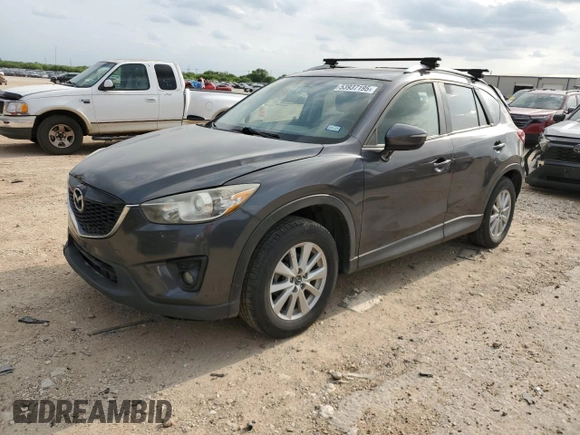 2015 Mazda CX-5 Touring with VIN JM3KE4CY0F0517821, listed as a Copart auction lot 53937195 with 165,852 mi miles and Salvage Title. Bid and sale history available at DreamBid. Image 1.