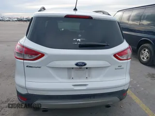 2015 Ford Escape SE with VIN 1FMCU0GX2FUB33893, listed as a IAAI auction lot 41455605 with 128,383 mi miles. Bid and sale history available at carsss.com. Image 16.