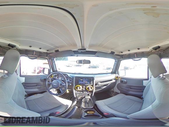 2009 Jeep Wrangler Rubicon with VIN 1J4GA64149L757121, listed as a Copart auction lot 74258934 with 73,241 mi miles and Salvage Title. Bid and sale history available at DreamBid. Image 13.