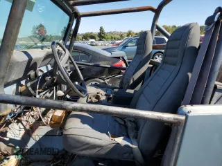 1985 Jeep CJ z VIN 1JCCF87E7FT035118, wystawiony jako Copart lot #70082064 z przebiegiem Nie podano mil oraz Tytuł czysty. Historia ofert i sprzedaży dostępna na DreamBid. Obrazek 7.