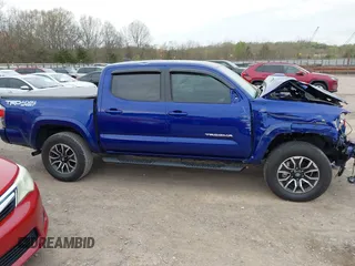 2023 Toyota Tacoma SR z VIN 3TMCZ5AN1PM589061, wystawiony jako IAAI lot #41936717 z przebiegiem 41 395 mil mil oraz . Historia ofert i sprzedaży dostępna na DreamBid. Obrazek 13.
