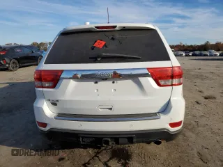 2013 Jeep Grand Cherokee Overland with VIN 1C4RJFCG5DC639401, listed as a Copart auction lot 79003094 with 0 mi miles and Salvage Title. Bid and sale history available at carsss.com. Image 6.