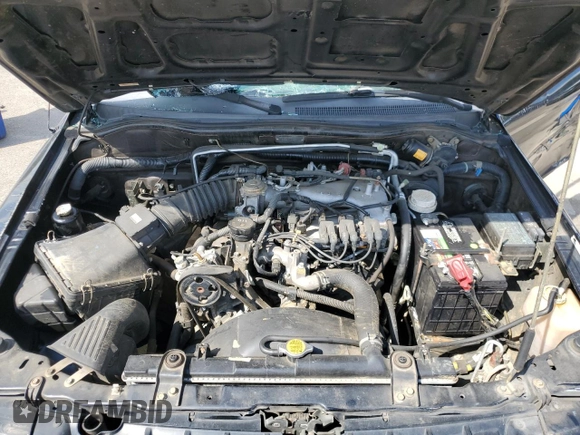 2002 Mitsubishi Montero ES z VIN JA4LS21H02J022594, wystawiony jako Copart lot #72750954 z przebiegiem 122 232 mil mil oraz Szkody całkowita. Historia ofert i sprzedaży dostępna na DreamBid. Obrazek 13.
