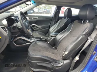 2012 Hyundai Veloster w/Red Int z VIN KMHTC6AD2CU048049, wystawiony jako Copart lot #85809854 z przebiegiem 122 914 mil mil oraz Szkoda całkowita • Salvage title. Historia ofert i sprzedaży dostępna na DreamBid. Obrazek 7.