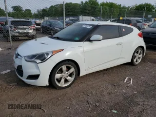2014 Hyundai Veloster z VIN KMHTC6AD3EU196228, wystawiony jako Copart lot #56653655 z przebiegiem 153 411 mil mil oraz Czysty tytuł • Clean title. Historia ofert i sprzedaży dostępna na DreamBid. Obrazek 1.
