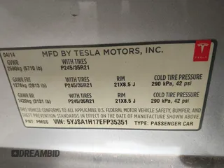 2014 Tesla Model S 60 with VIN 5YJSA1H17EFP35351, listed as a IAAI auction lot 41558434 with 151,002 mi miles and . Bid and sale history available at DreamBid. Image 9.
