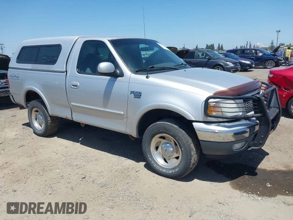 2000 Ford F-150 XL z VIN 1FTRF18L1YKA63179, wystawiony jako IAAI lot #42532771 z przebiegiem 116 604 mil mil oraz . Historia ofert i sprzedaży dostępna na DreamBid. Obrazek 1.