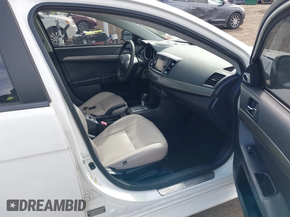 2015 Mitsubishi Lancer SE with VIN JA32V2FW9FU025402, listed as a IAAI auction lot 41646407 with 67,201 mi miles. Bid and sale history available at carsss.com. Image 5.