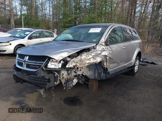 2015 Dodge Journey SE z VIN 3C4PDCAB3FT641675, wystawiony jako IAAI lot #41898611 z przebiegiem 218 121 mil mil oraz . Historia ofert i sprzedaży dostępna na DreamBid. Obrazek 6.
