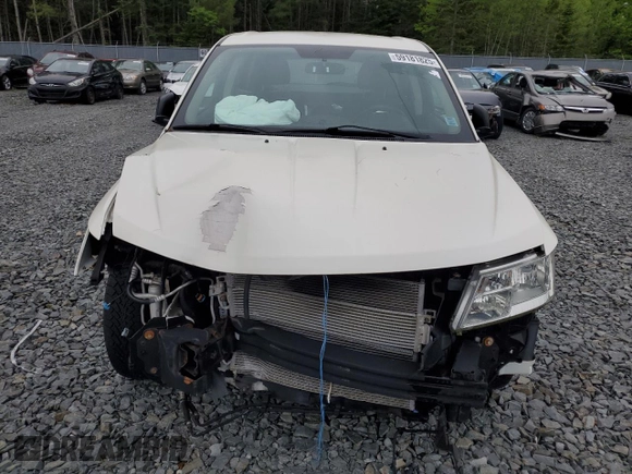 2015 Dodge Journey SE z VIN 3C4PDCABXFT595441, wystawiony jako Copart lot #59181825 z przebiegiem 122 263 mil mil oraz Szkoda całkowita • Salvage title. Historia ofert i sprzedaży dostępna na DreamBid. Obrazek 5.