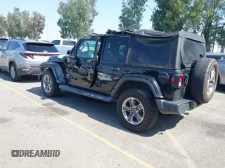 2018 Jeep Wrangler Unlimited Sahara with VIN 1C4HJXEN7JW328981, listed as a IAAI auction lot 42217508 with 59,584 mi miles and . Bid and sale history available at DreamBid. Image 3.