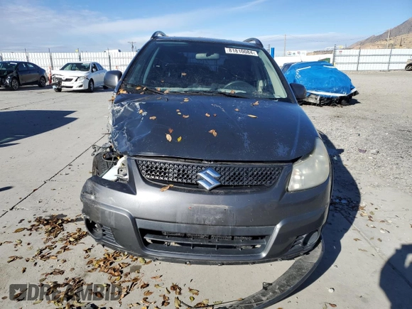 2010 Suzuki SX4 z VIN JS2YA5A35A6301406, wystawiony jako Copart lot #81810084 z przebiegiem 134 349 mil mil oraz Szkody całkowita. Historia ofert i sprzedaży dostępna na DreamBid. Obrazek 5.