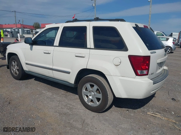 2010 Jeep Grand Cherokee Laredo with VIN 1J4PS4GK6AC112447, listed as a IAAI auction lot 42086245 with 150,875 mi miles. Bid and sale history available at carsss.com. Image 3.