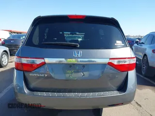 2012 Honda Odyssey EX-L with VIN 5FNRL5H64CB044075, listed as a IAAI auction lot 42094680 with 67,165 mi miles and . Bid and sale history available at carsss.com. Image 16.