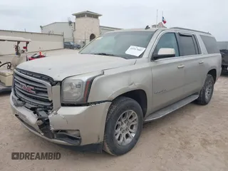 2015 GMC Yukon XL SLE z VIN 1GKS1GKC1FR155056, wystawiony jako IAAI lot #41517607 z przebiegiem 174 634 mil mil oraz . Historia ofert i sprzedaży dostępna na DreamBid. Obrazek 17.