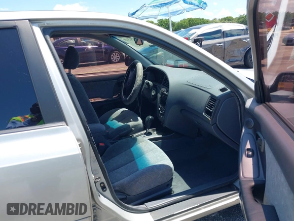 2002 Hyundai Elantra GLS with VIN KMHDN45DX2U310539, listed as a IAAI auction lot 42523118 with 196,121 mi miles and . Bid and sale history available at DreamBid. Image 5.