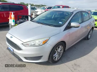2015 Ford Focus SE with VIN 1FADP3F2XFL340583, listed as a IAAI auction lot 42099224 with 111,970 mi miles. Bid and sale history available at carsss.com. Image 2.