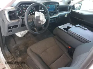 2023 Ford F-150 XL with VIN 1FTMF1C5XPKE35376, listed as a Copart auction lot 57109915 with 25,832 mi miles and Salvage title. Bid and sale history available at DreamBid. Image 8.
