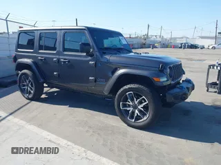 2024 Jeep Wrangler Sport S with VIN 1C4RJXN61RW192386, listed as a IAAI auction lot 42001810 with 7,426 mi miles and . Bid and sale history available at DreamBid. Image 1.