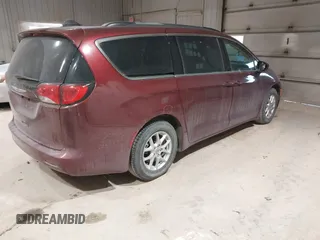 2021 Chrysler Voyager LXi with VIN 2C4RC1DG4MR528020, listed as a IAAI auction lot 41495159 with 72,896 mi miles and . Bid and sale history available at DreamBid. Image 4.