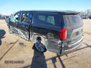 2023 GMC Yukon XL SLT z VIN 1GKS2GKT9PR208083, wystawiony jako IAAI lot #41285870 z przebiegiem 69 901 mil mil oraz . Historia ofert i sprzedaży dostępna na DreamBid. Obrazek 3.