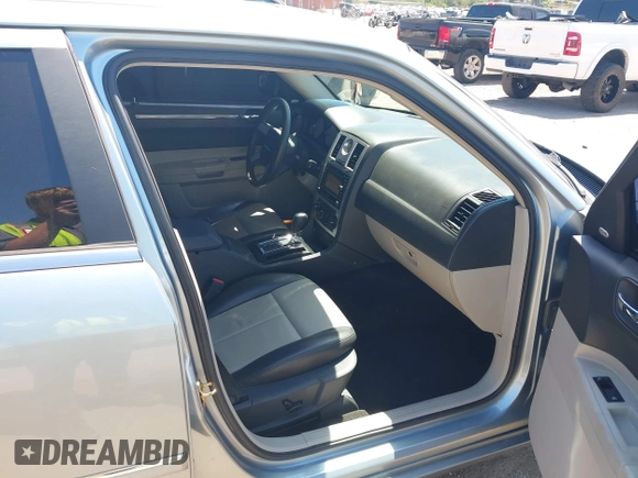 2006 Chrysler 300 Touring with VIN 2C3KA53G56H324954, listed as a IAAI auction lot 42058478 with 124,933 mi miles. Bid and sale history available at carsss.com. Image 5.