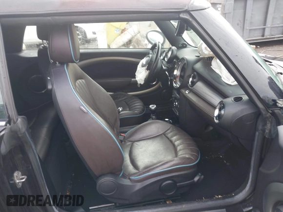 2013 MINI Convertible S with VIN WMWZP3C54DT297304, listed as a IAAI auction lot 41377572 with 101,991 mi miles and . Bid and sale history available at DreamBid. Image 5.