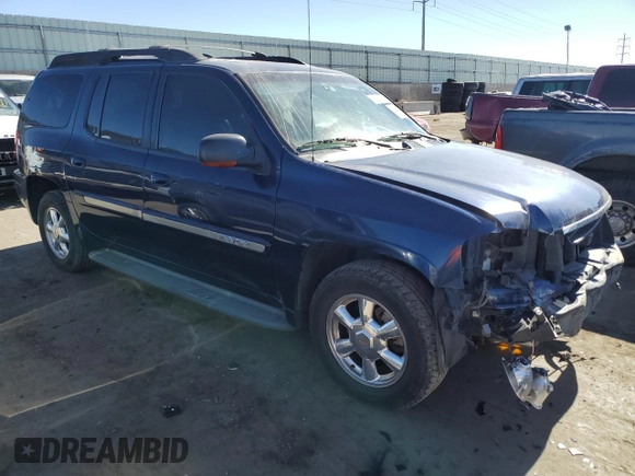 2003 GMC Envoy SLT z VIN 1GKET16S436169701, wystawiony jako Copart lot #44390805 z przebiegiem 168 236 mil mil oraz Szkoda całkowita • Salvage title. Historia ofert i sprzedaży dostępna na DreamBid. Obrazek 4.