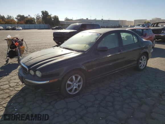 2004 Jaguar X-Type z VIN SAJEB52D94XD67350, wystawiony jako Copart lot #80131904 z przebiegiem 116 329 mil mil oraz Czysty tytuł • Clean title. Historia ofert i sprzedaży dostępna na DreamBid. Obrazek 1.