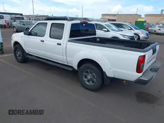 2004 Nissan Frontier XE z VIN 1N6ED29X54C475425, wystawiony jako IAAI lot #42292779 z przebiegiem 156 000 mil mil oraz . Historia ofert i sprzedaży dostępna na DreamBid. Obrazek 3.