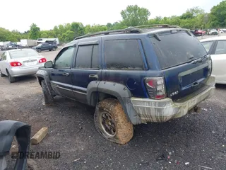 2001 Jeep Grand Cherokee Laredo z VIN 1J4GW48S91C698189, wystawiony jako IAAI lot #42315702 z przebiegiem 229 161 mil mil oraz . Historia ofert i sprzedaży dostępna na DreamBid. Obrazek 3.