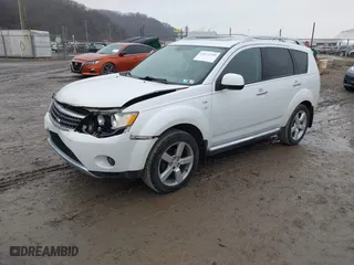 2009 Mitsubishi Outlander XLS with VIN JA4MT41X79Z012998, listed as a IAAI auction lot 41672540 with 120,058 mi miles. Bid and sale history available at carsss.com. Image 2.