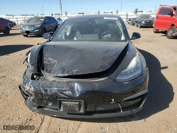 2019 Tesla Model 3 Long Range with VIN 5YJ3E1EB9KF213659, listed as a Copart auction lot 73509474 with 54,000 mi miles and Salvage Title. Bid and sale history available at carsss.com. Image 5.