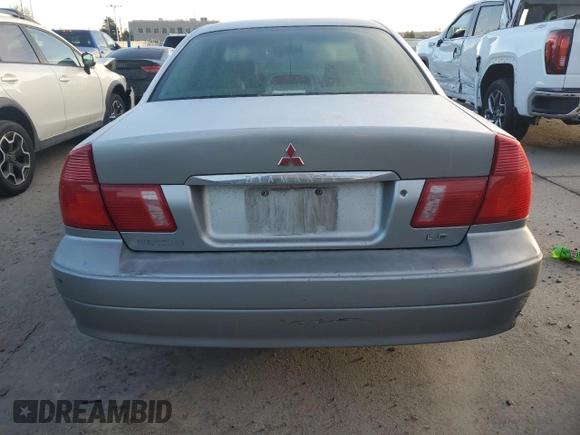 2000 Mitsubishi Diamante LS z VIN 6MMAP67P5YT006608, wystawiony jako Copart lot #49009455 z przebiegiem 241 503 mil mil oraz Tytuł czysty. Historia ofert i sprzedaży dostępna na DreamBid. Obrazek 6.
