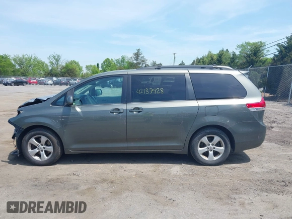 2011 Toyota Sienna LE AAS with VIN 5TDKK3DC7BS014356, listed as a IAAI auction lot 42137928 with 198,400 mi miles and . Bid and sale history available at DreamBid. Image 14.