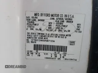 2004 Ford F-150 STX with VIN 1FTRX12W04NB71236, listed as a Copart auction lot 81882684 with 281,968 mi miles and Salvage title. Bid and sale history available at DreamBid. Image 12.